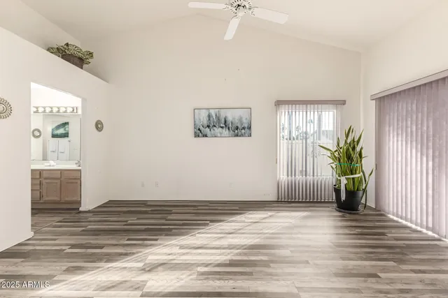 a view of a golf course with a trees