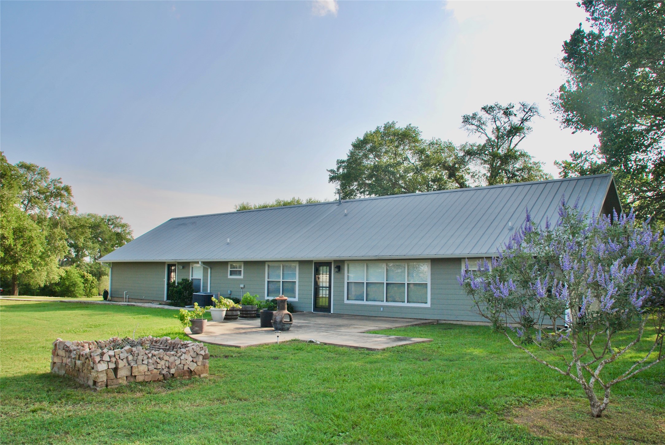 3545 East I- 10 Frontage Road Schulenburg, TX 78956 - Photo 3 of 40 a front view of a house with garden