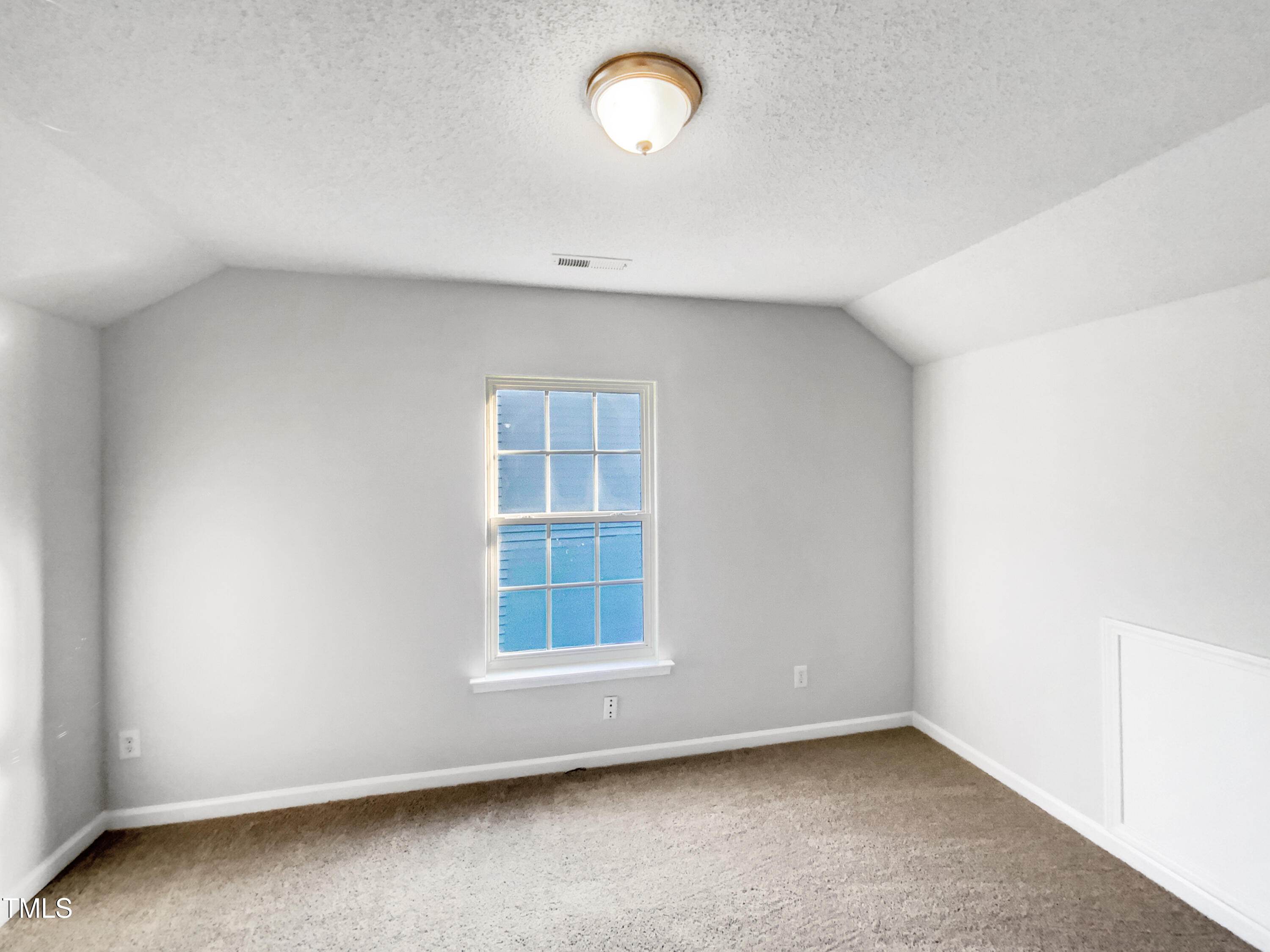 102 Spring Dove Lane Apex, NC 27539 - Photo 13 of 20 an empty room with windows
