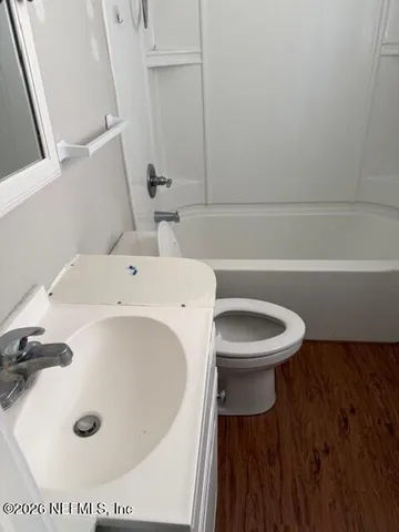 a bathroom with a sink and a toilet