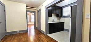 800 Verner Street Northwest Atlanta, GA 30318 - Photo 3 of 8 a view of living room with furniture and wooden floor