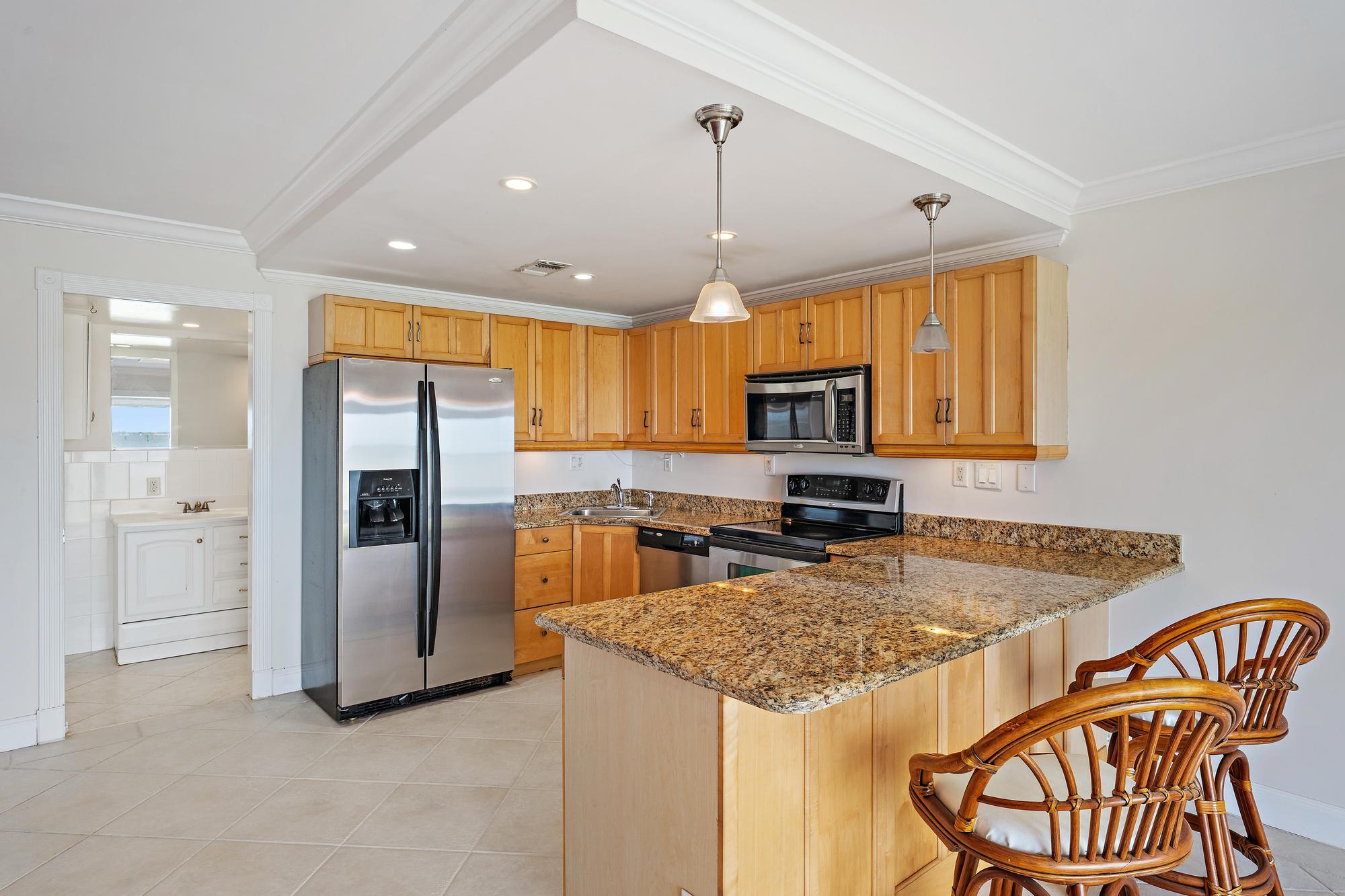 400 Wilma Circle, Unit 108 Riviera Beach, FL 33404 - Photo 4 of 21 Open Kitchen