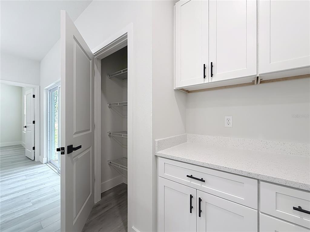 8425 North Legacy Loop Citrus Springs, FL 34433 - Photo 15 of 51 a view of white cabinets
