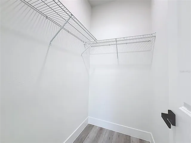 a view of a room with racks on the wall