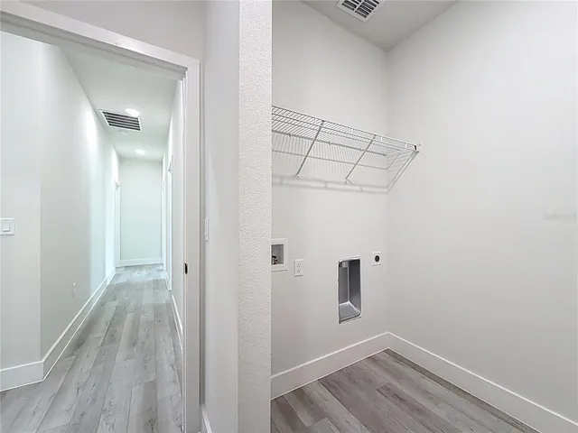 a view of a room with an empty space