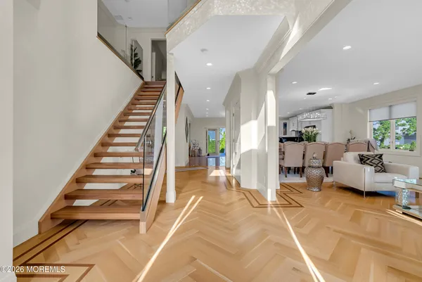 a view of a living room and entryway