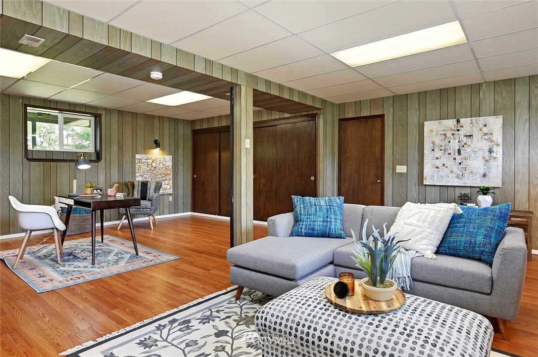 795 South 27th Street Renton, WA 98055 - Photo 13 of 14 a living room with furniture a rug and a window