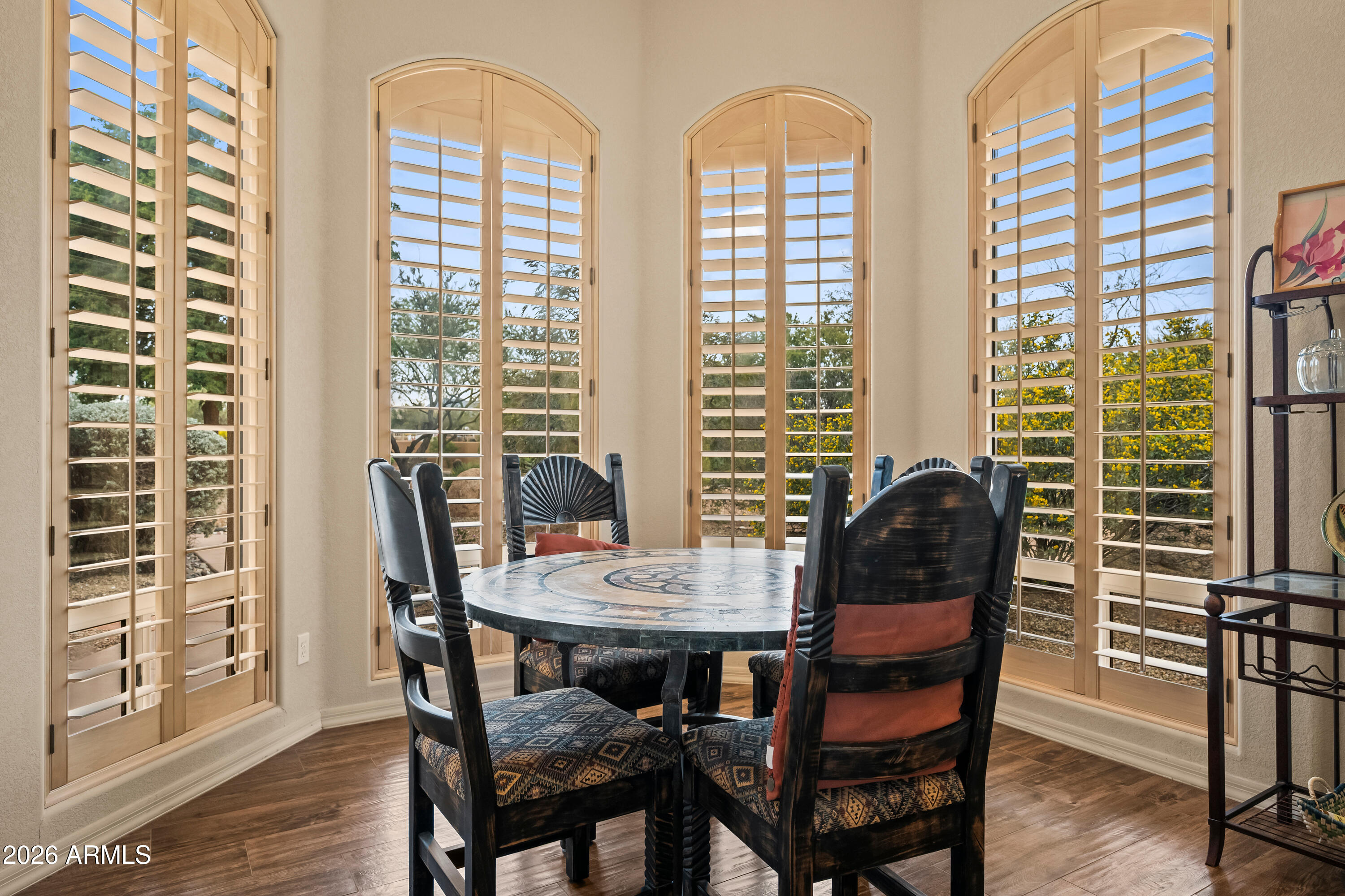 18908 East Quartz Way Rio Verde, AZ 85263 - Photo 18 of 40 a view of a dining room with furniture and windows