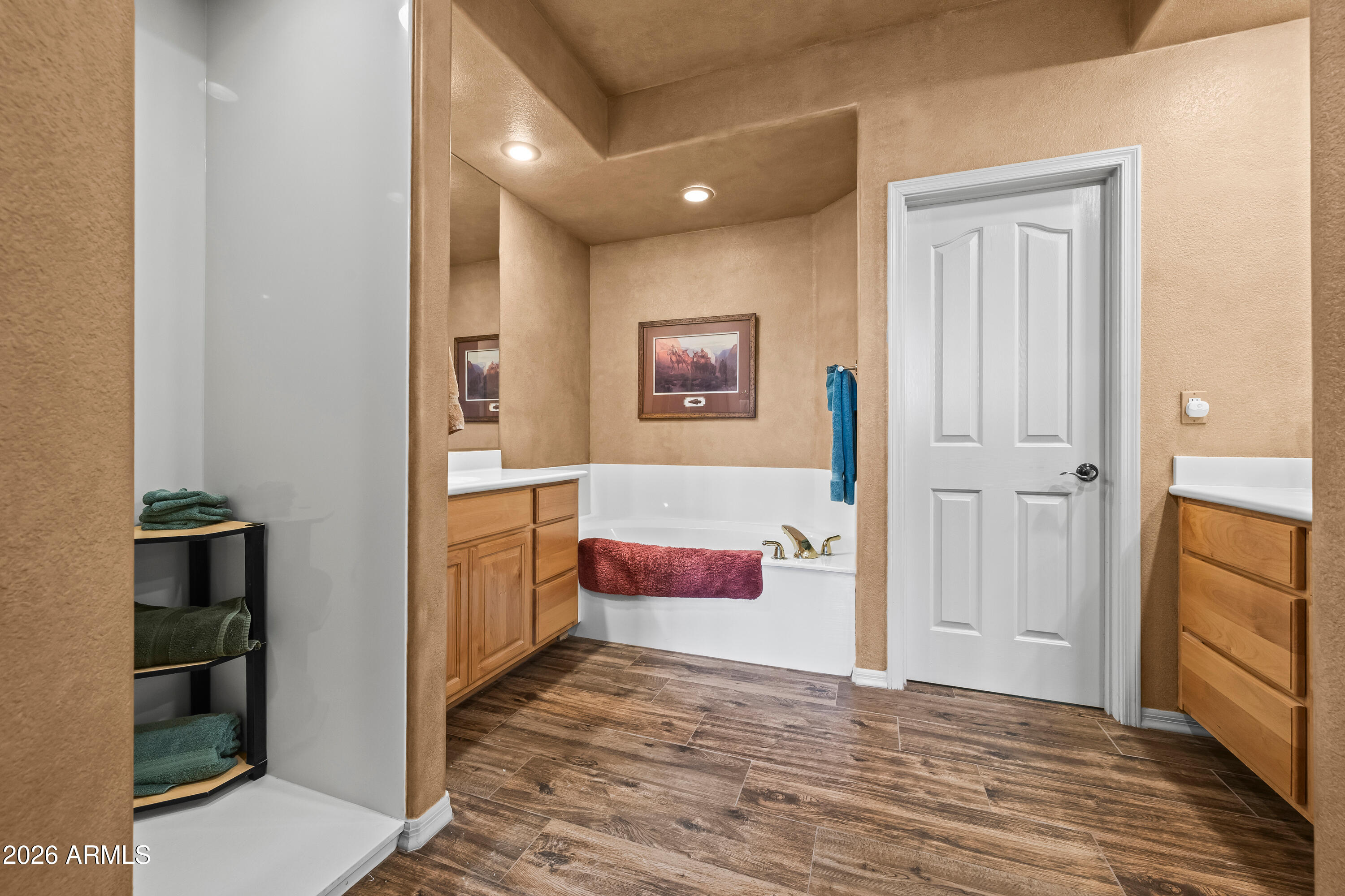 18908 East Quartz Way Rio Verde, AZ 85263 - Photo 23 of 40 a bathroom with a tub shower and sink