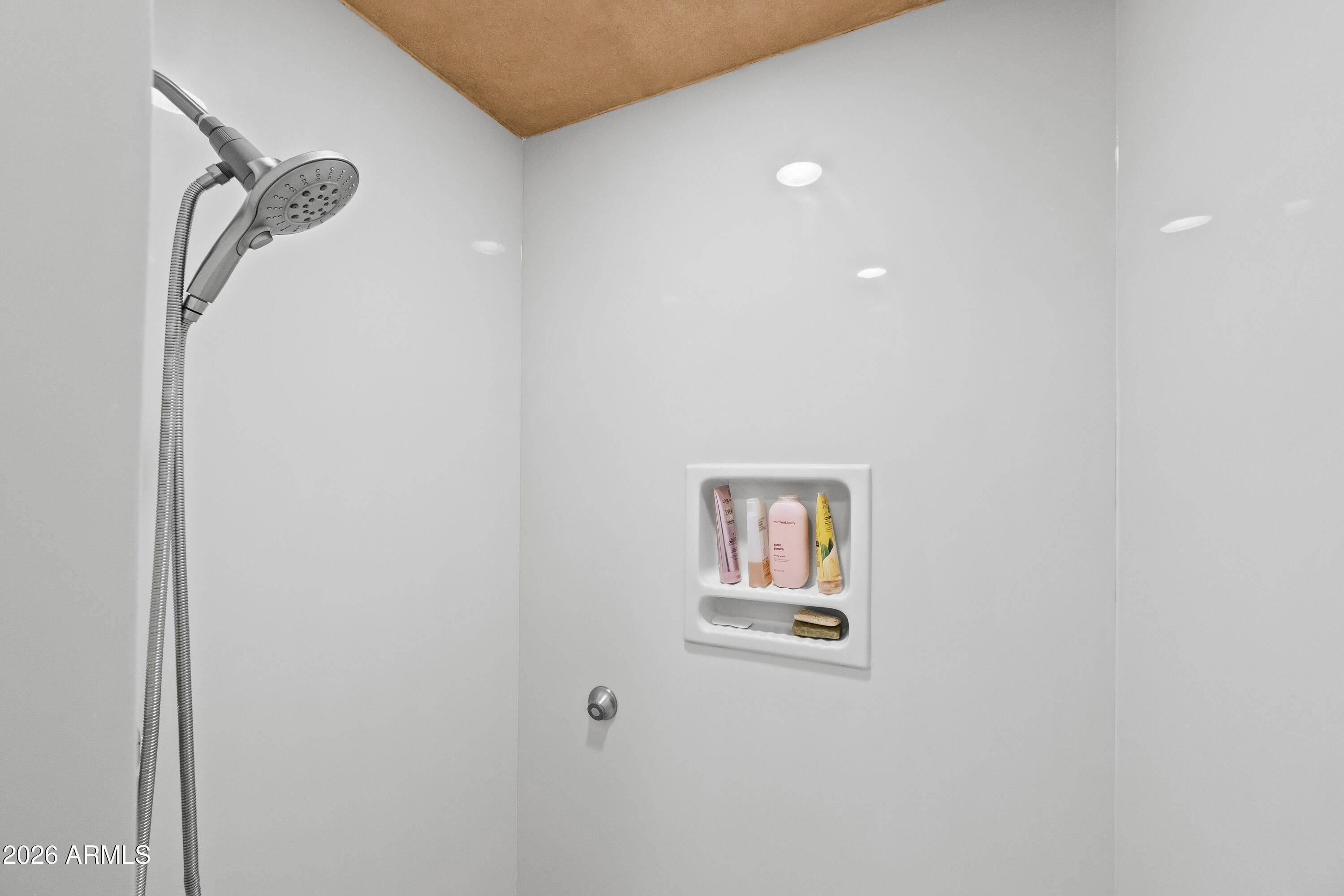 18908 East Quartz Way Rio Verde, AZ 85263 - Photo 26 of 40 a view of a bathroom with a shower and a sink