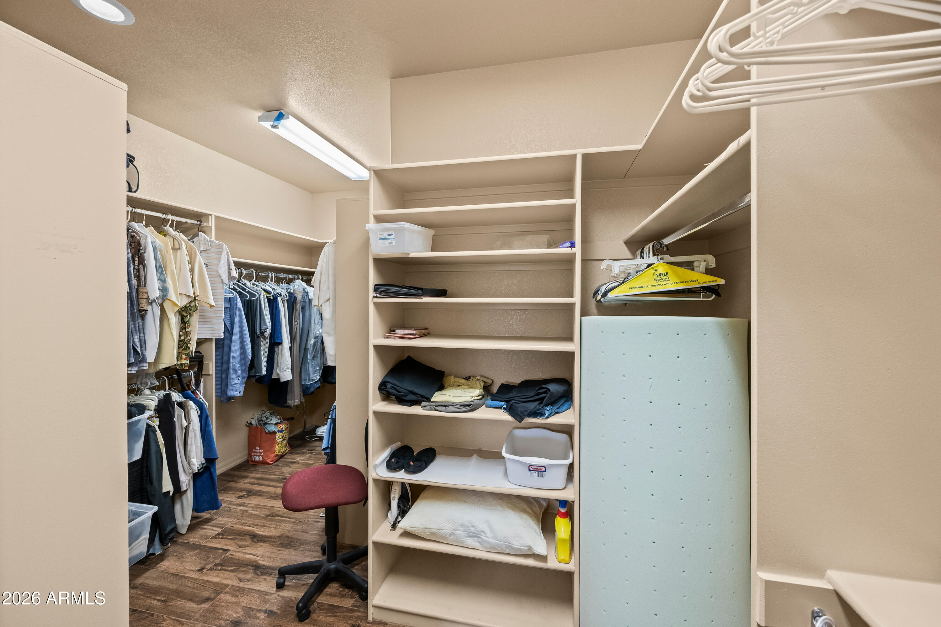18908 East Quartz Way Rio Verde, AZ 85263 - Photo 27 of 40 a view of walk in closet with clothes and shoes