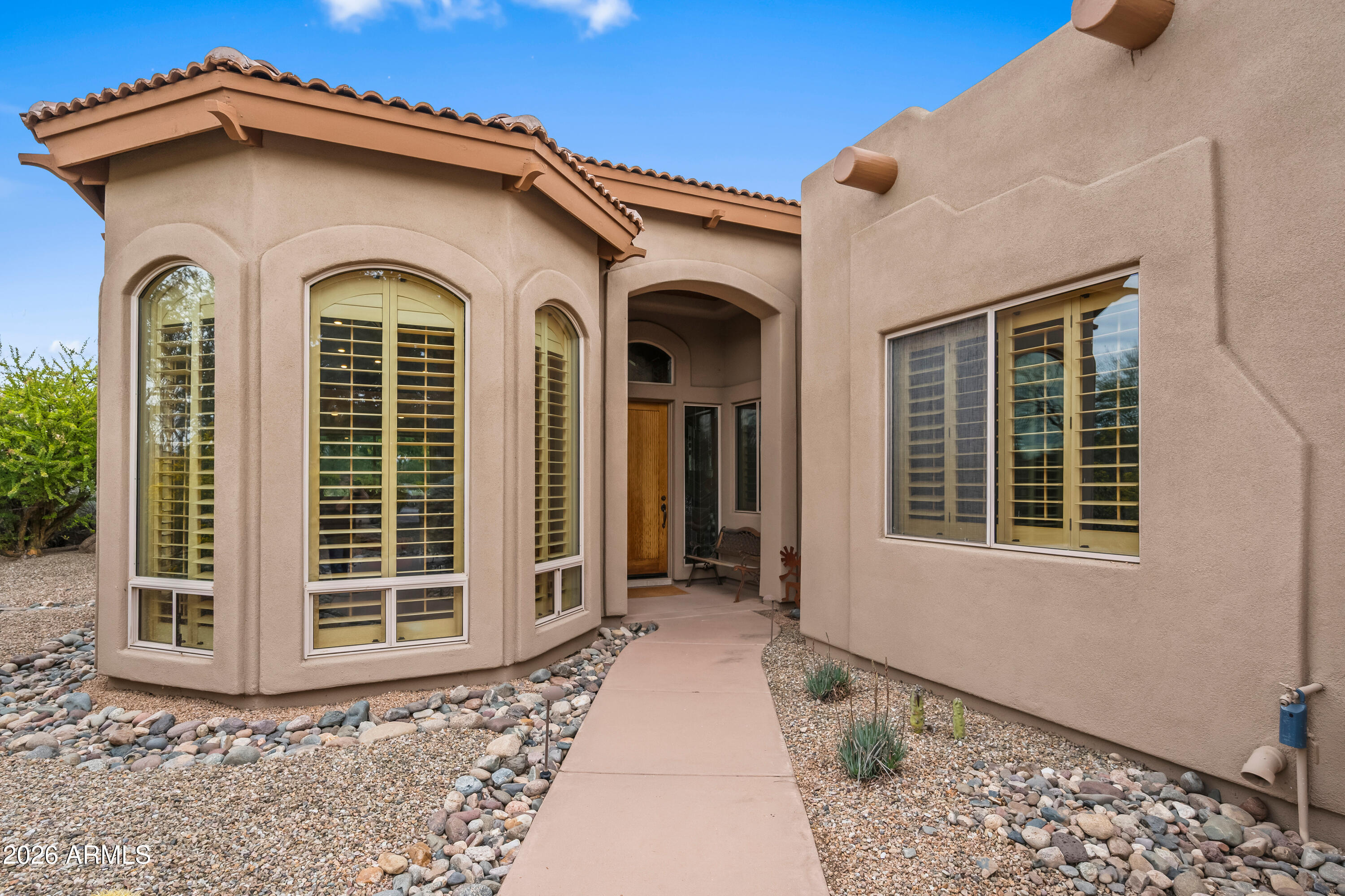 18908 East Quartz Way Rio Verde, AZ 85263 - Photo 4 of 40 a front view of a house