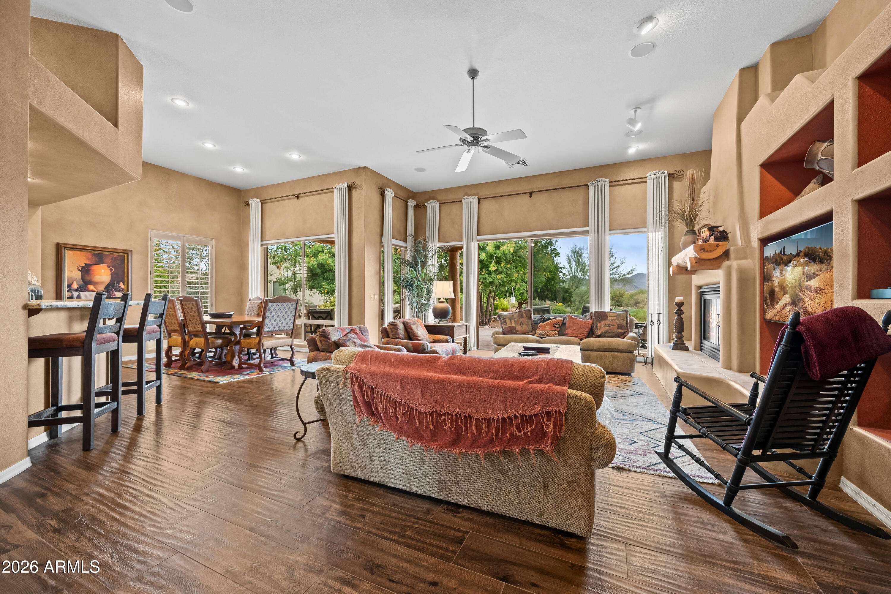 18908 East Quartz Way Rio Verde, AZ 85263 - Photo 7 of 40 a living room with furniture and a large window