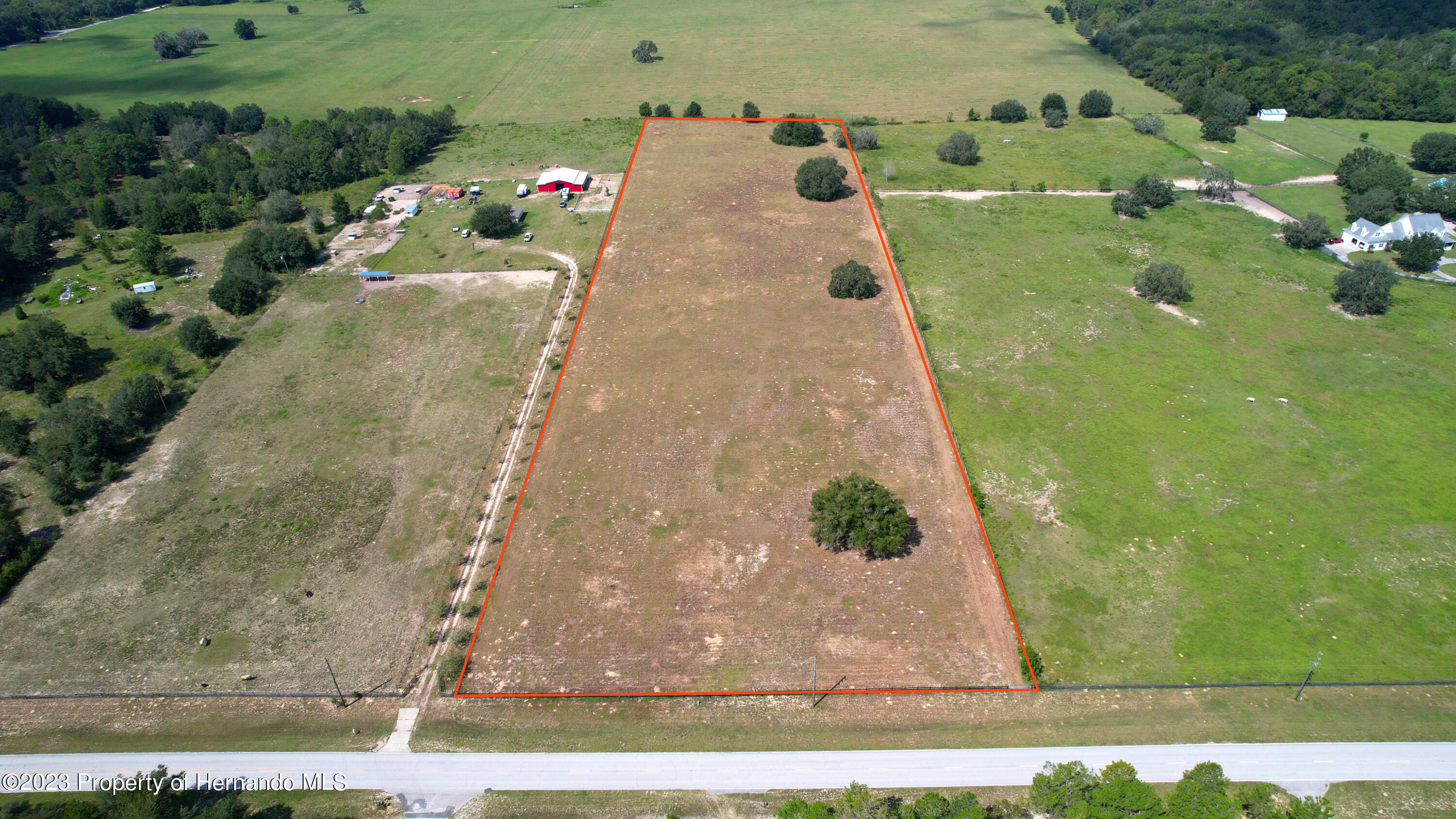 13404 South Pleasant Grove Road Floral City, FL 34436 - Photo 1 of 21 an aerial view of a house