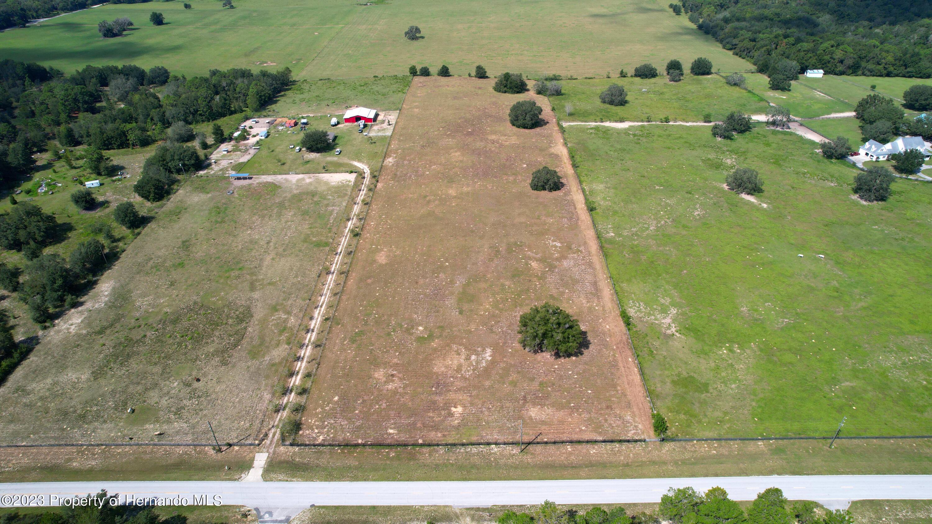 13404 South Pleasant Grove Road Floral City, FL 34436 - Photo 3 of 21 an aerial view of a house