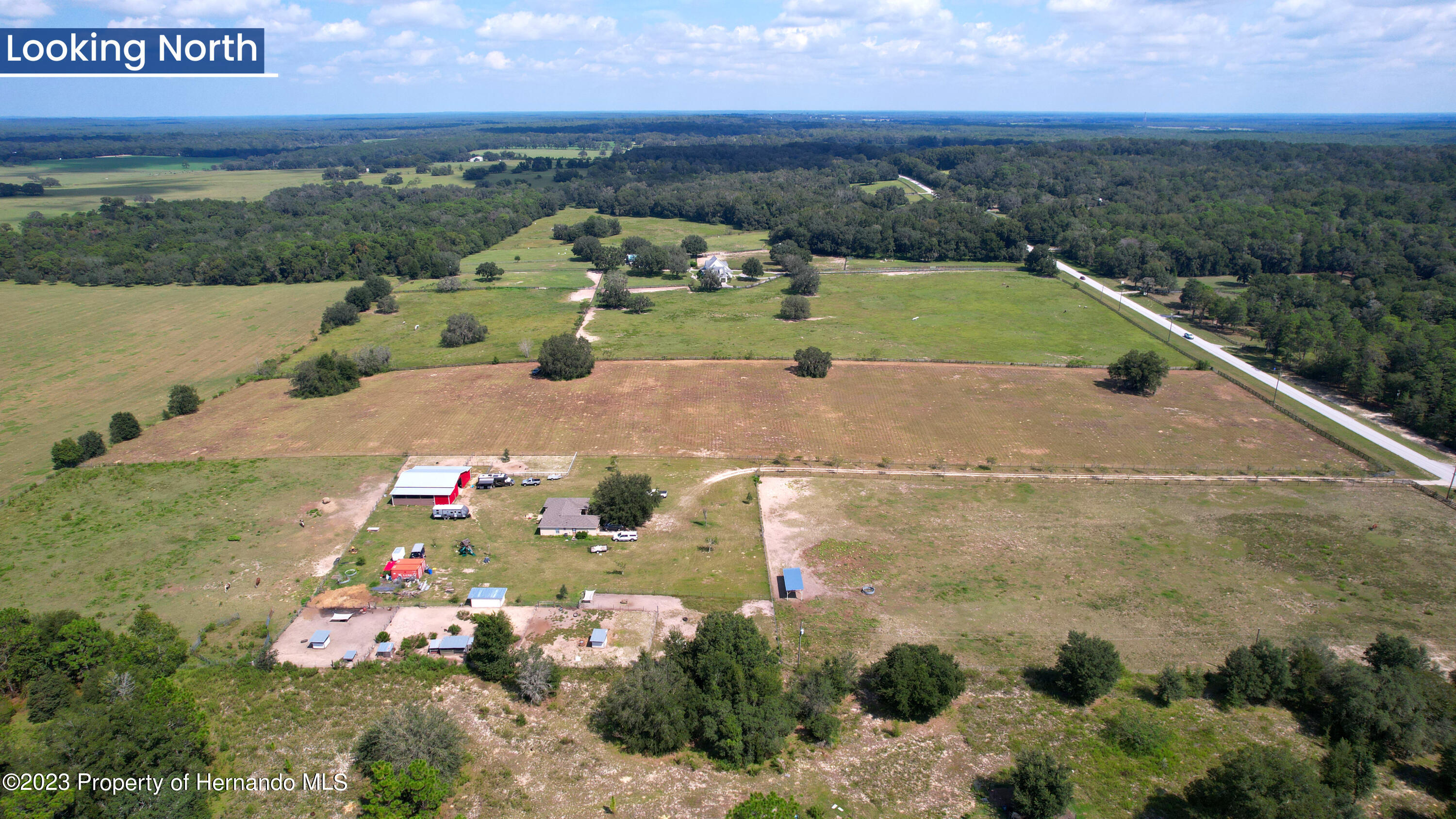 13404 South Pleasant Grove Road Floral City, FL 34436 - Photo 4 of 21 an aerial view of a residential houses