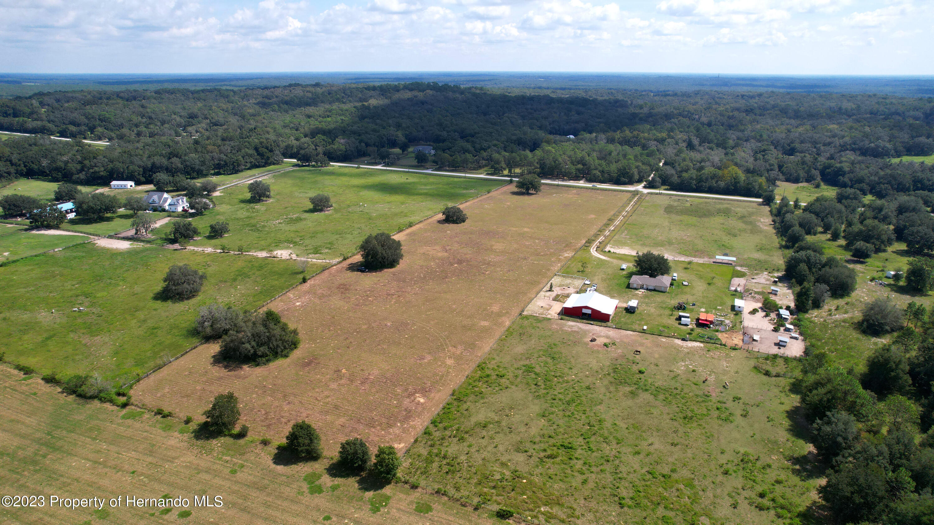 13404 South Pleasant Grove Road Floral City, FL 34436 - Photo 5 of 21 an aerial view of a house with a yard