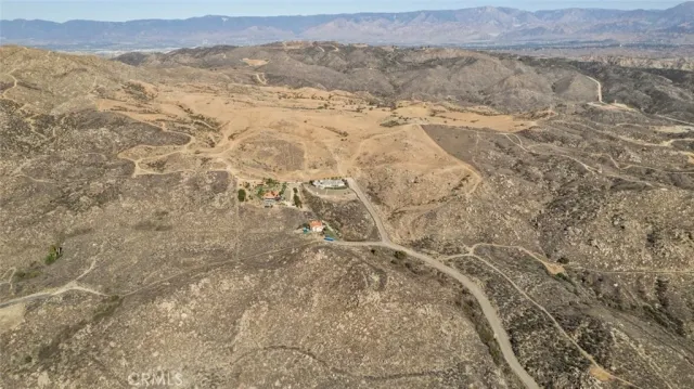 a view of ocean and mountain