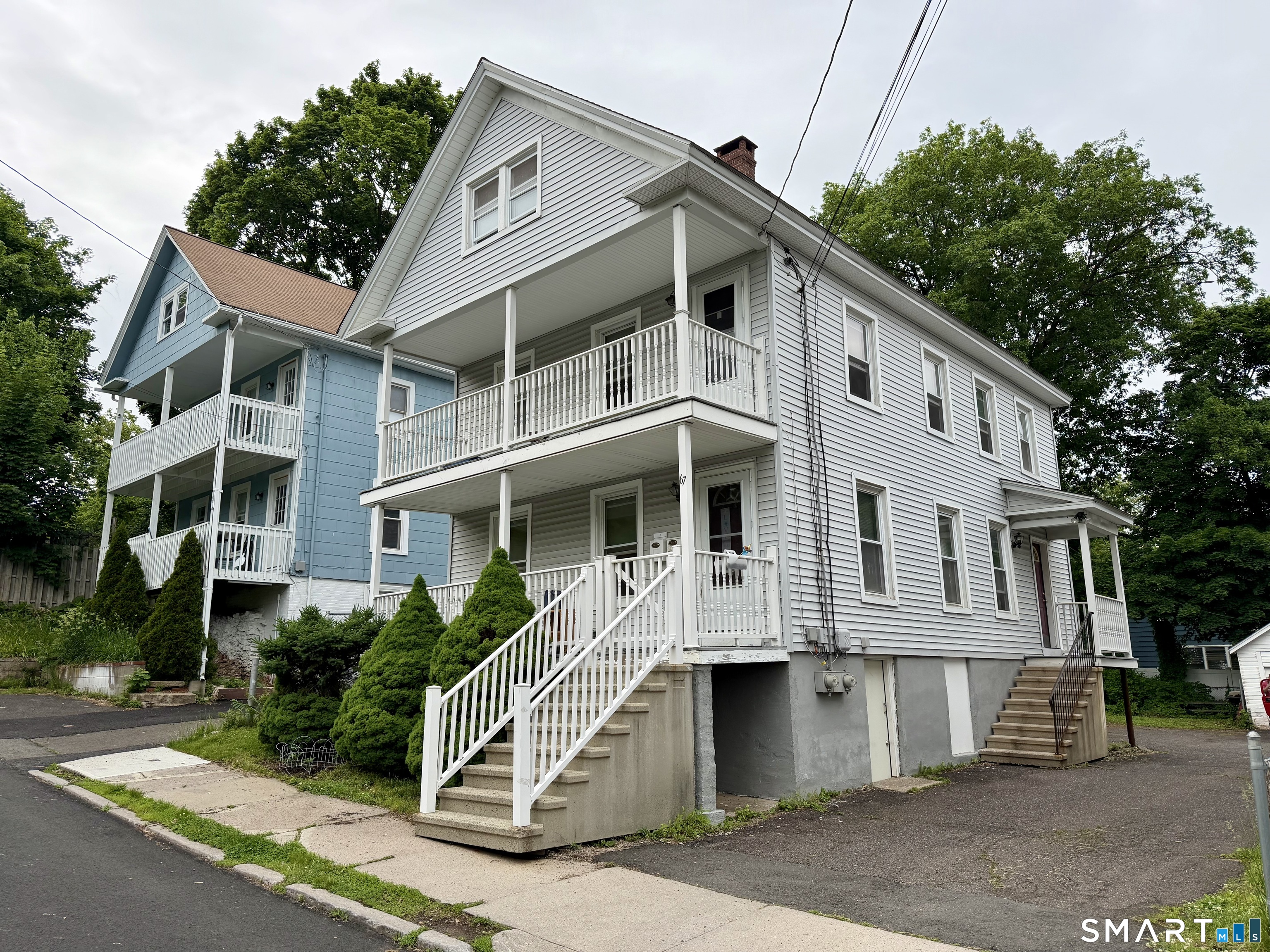 67 Pine Street Meriden, CT 06451 - Photo 30 of 34 a front view of a house with a yard