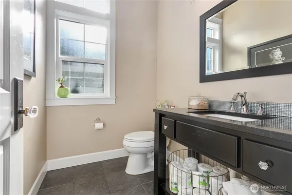 a bathroom with a sink and a toilet