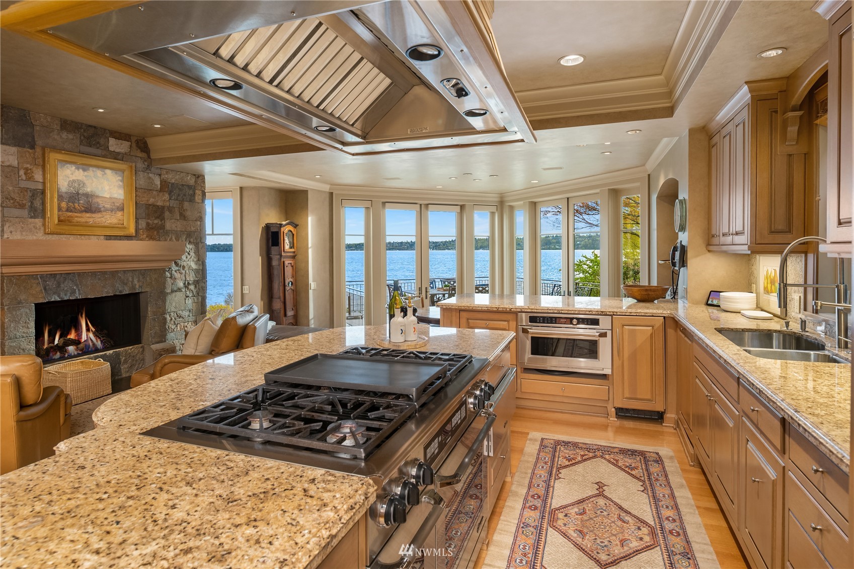 611 Evergreen Point Road Medina, WA 98039 - Photo 12 of 40 a large kitchen with a stove a sink and a refrigerator