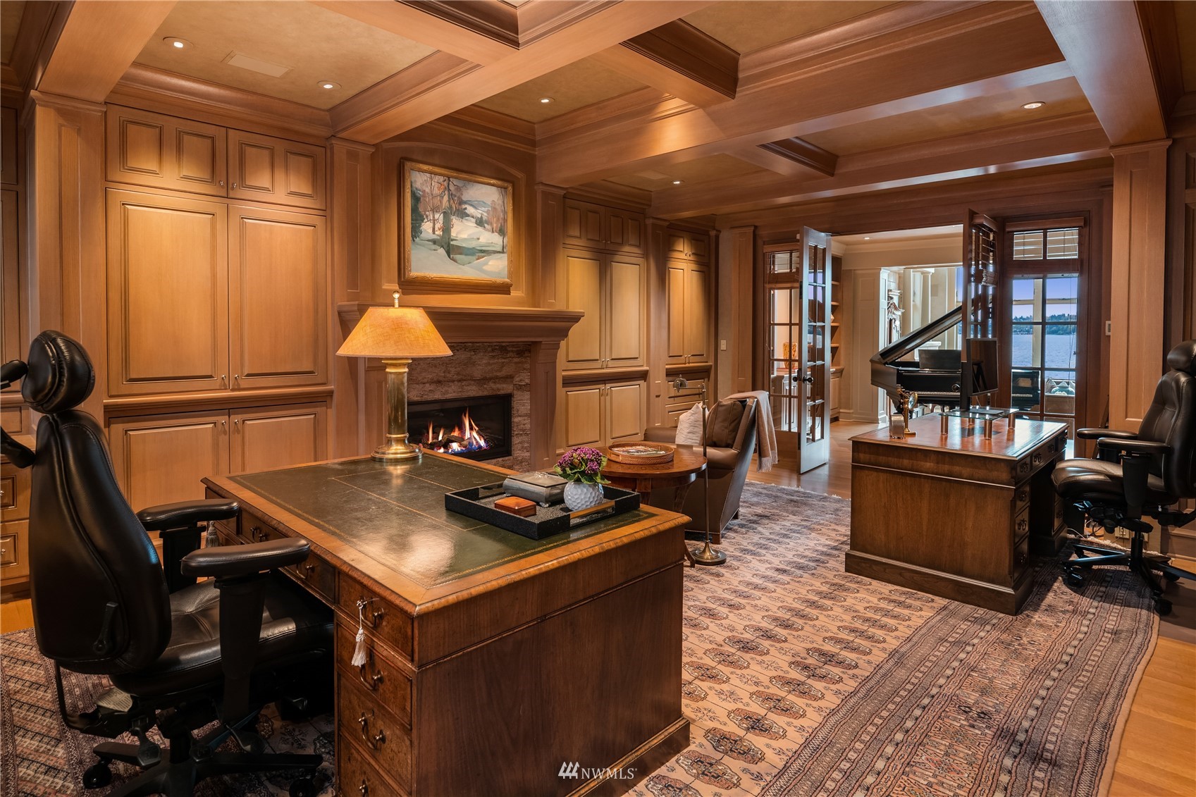 611 Evergreen Point Road Medina, WA 98039 - Photo 16 of 40 a living room with furniture a piano and a fireplace