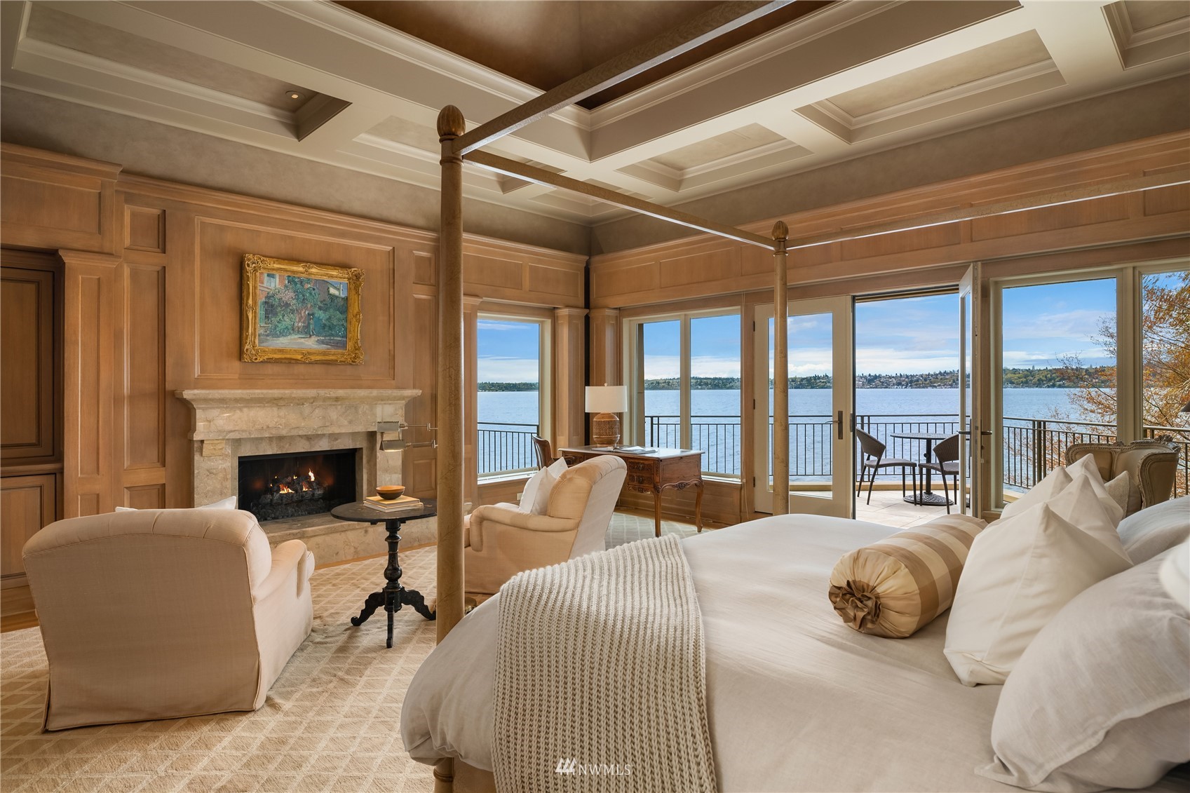 611 Evergreen Point Road Medina, WA 98039 - Photo 18 of 40 a bedroom with furniture and a fireplace