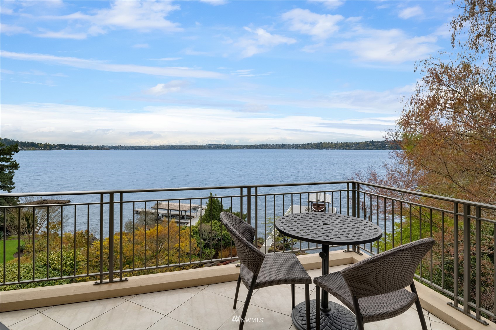 611 Evergreen Point Road Medina, WA 98039 - Photo 21 of 40 a balcony with table and chairs