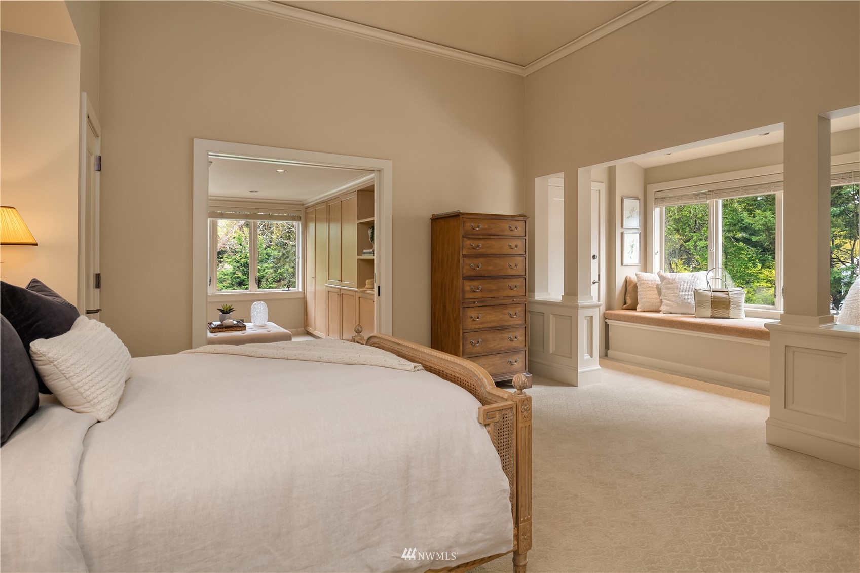 611 Evergreen Point Road Medina, WA 98039 - Photo 26 of 40 a bedroom with a bed and glass door