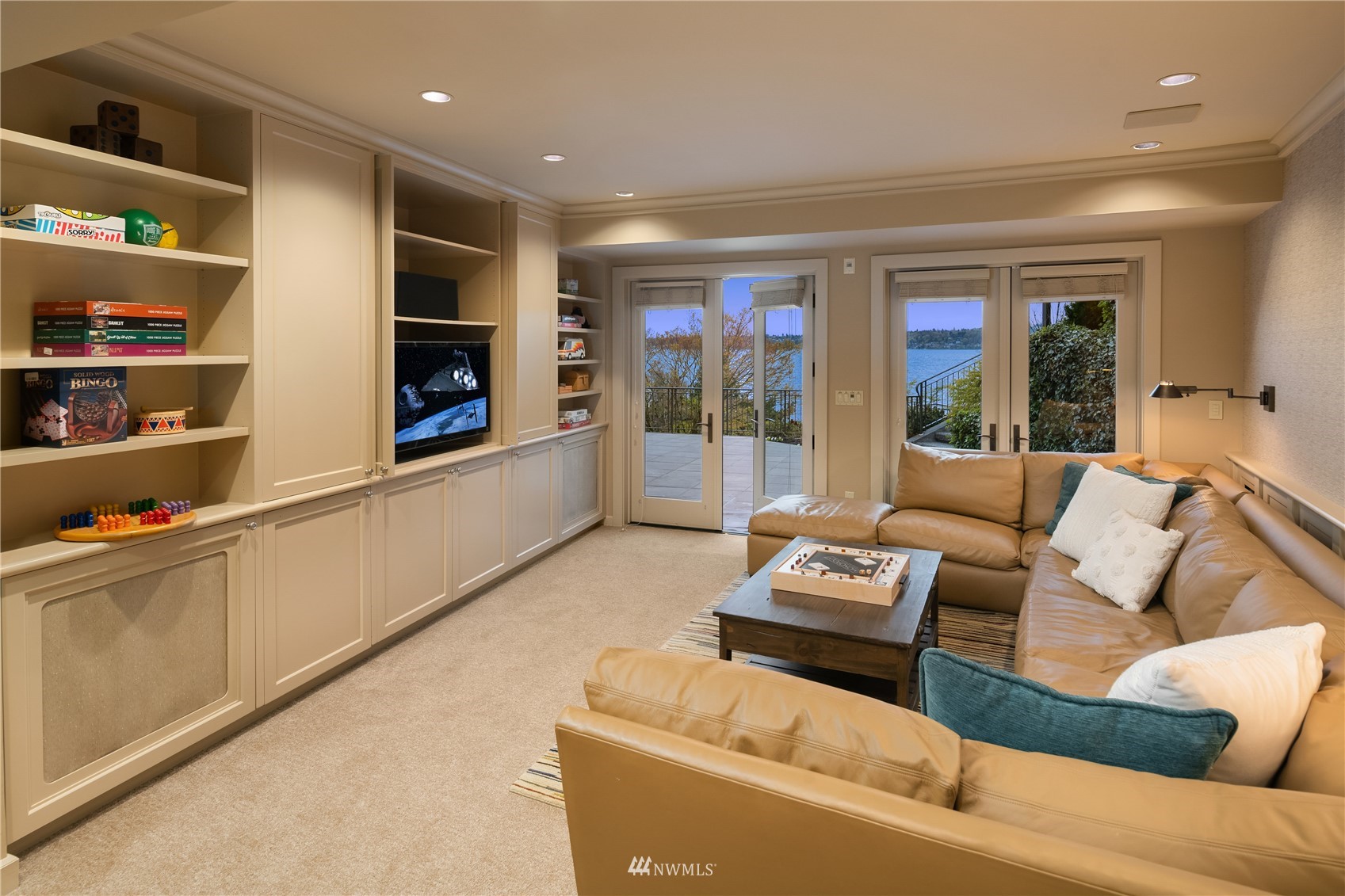 611 Evergreen Point Road Medina, WA 98039 - Photo 27 of 40 a living room with furniture and a window