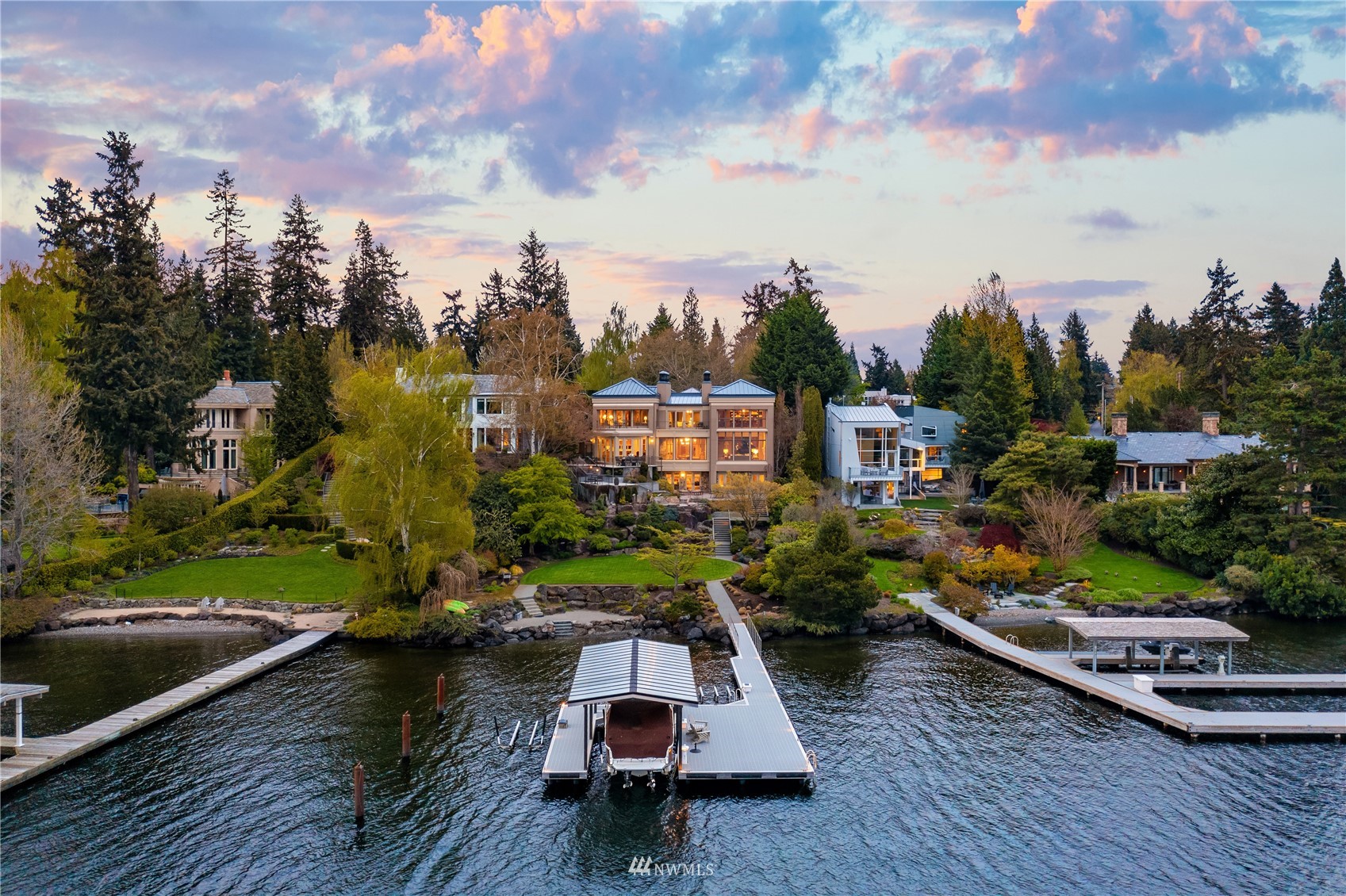 611 Evergreen Point Road Medina, WA 98039 - Photo 38 of 40 a view of a house with a garden and lake view