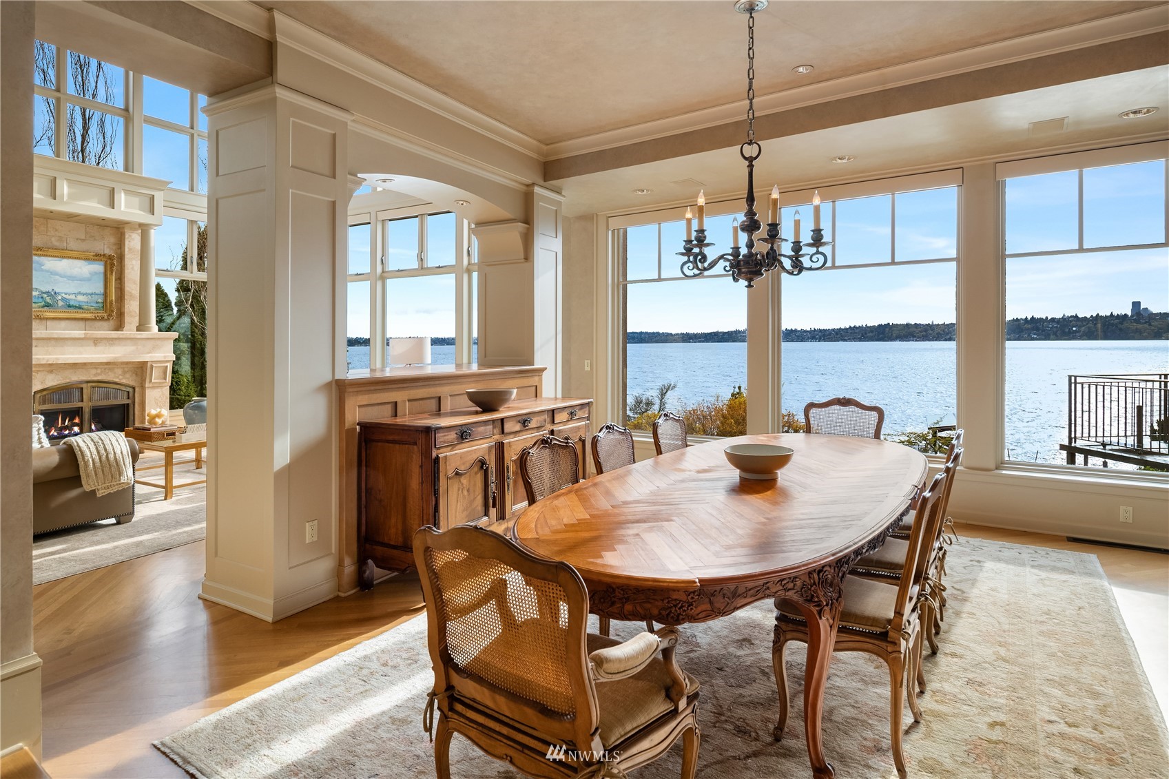 611 Evergreen Point Road Medina, WA 98039 - Photo 10 of 40 a dining room with furniture a chandelier and window