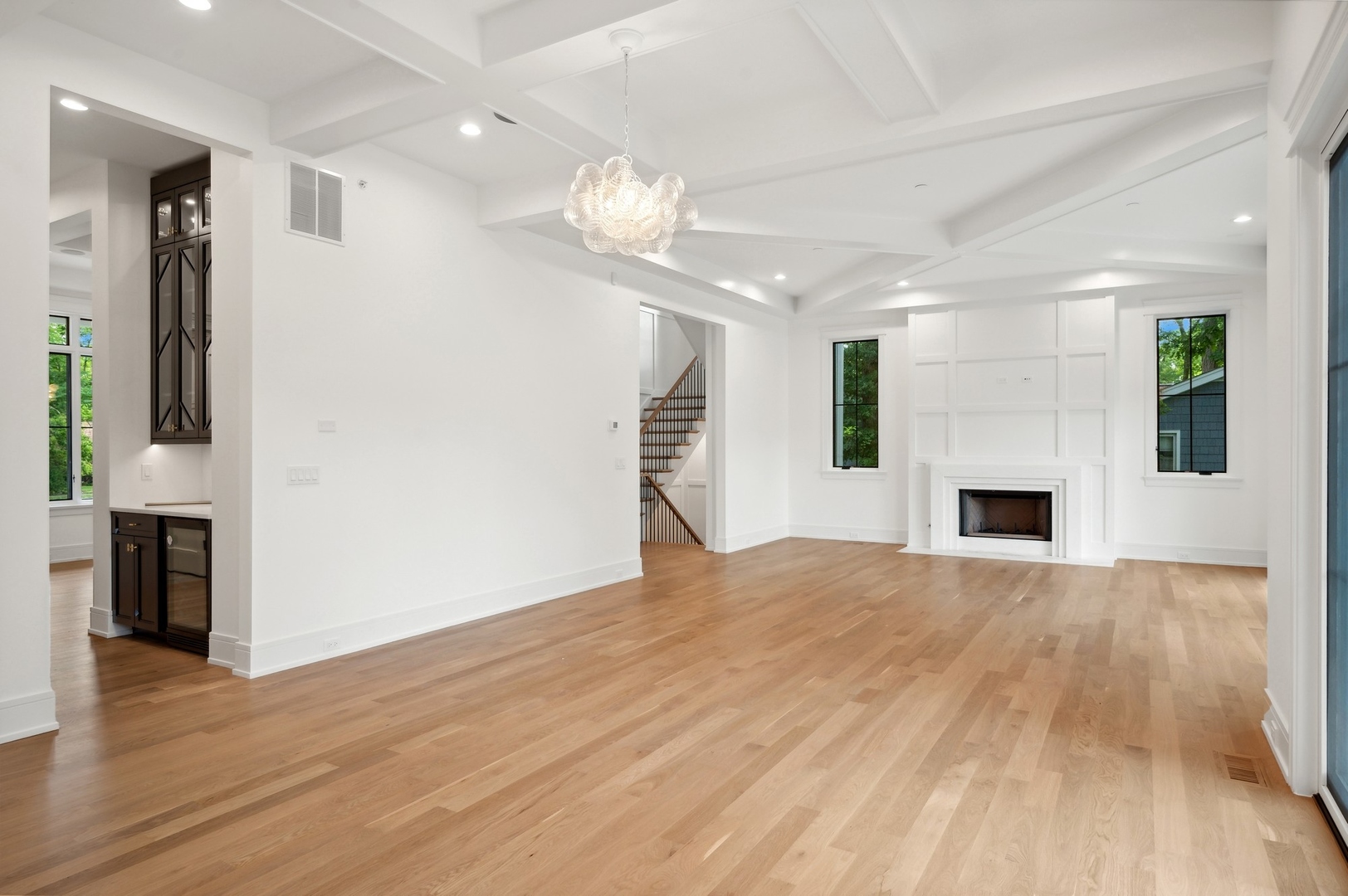 757 Kipling Place Deerfield, IL 60015 - Photo 14 of 35 an empty room with wooden floor and fireplace