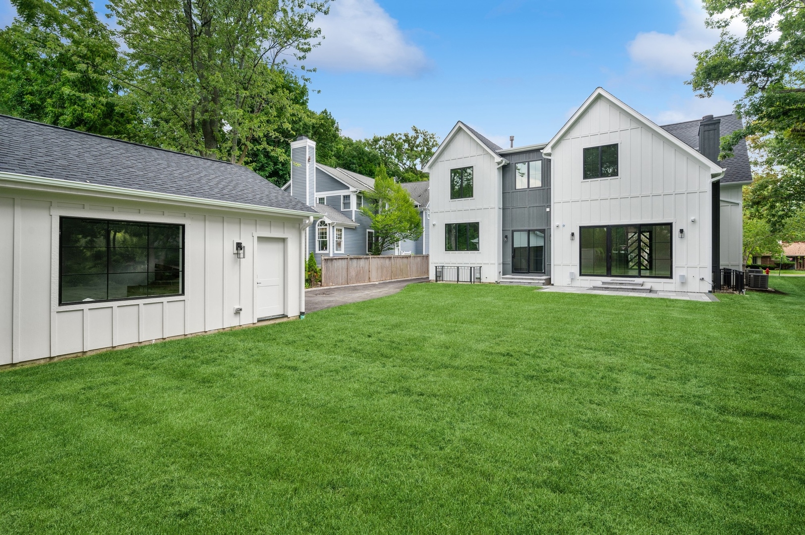 757 Kipling Place Deerfield, IL 60015 - Photo 34 of 35 a front view of a house with a garden and yard