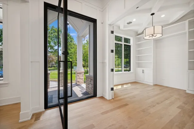 a view of an empty room with a sliding door