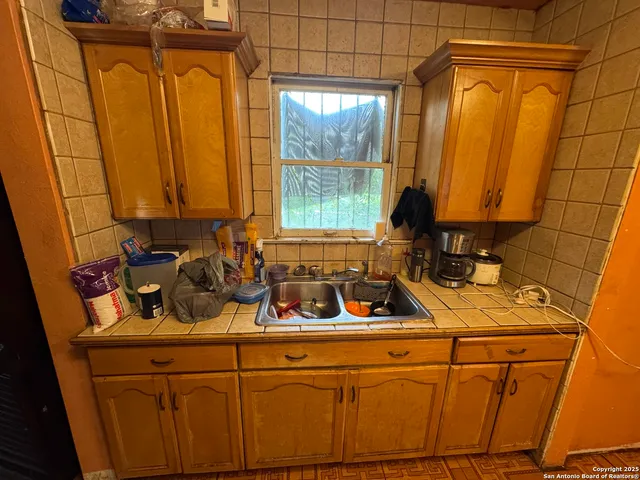 a view of a living room and dining room