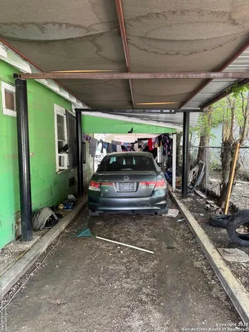 a backyard of a house with yard and outdoor seating