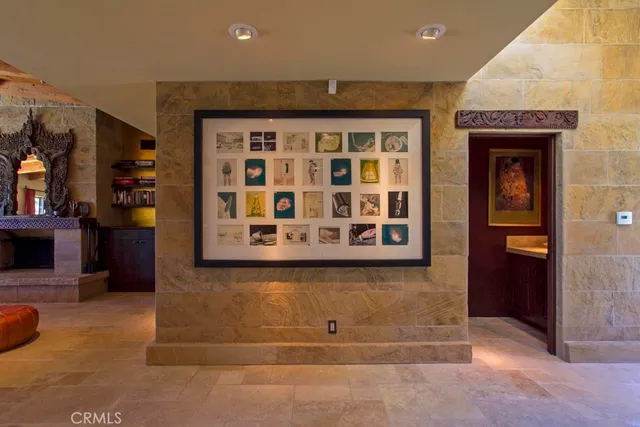 a kitchen with stainless steel appliances granite countertop a sink and cabinets