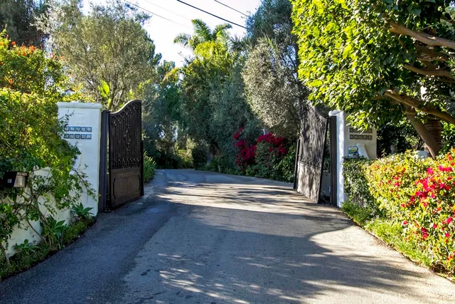 a view of a front door and wooden door
