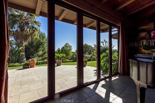 a spacious bedroom with a bed and a fireplace