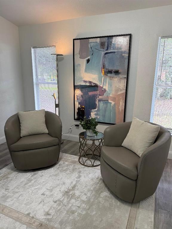 1502 West 16th Street Sanford, FL 32771 - Photo 5 of 12 a living room with furniture and a large window