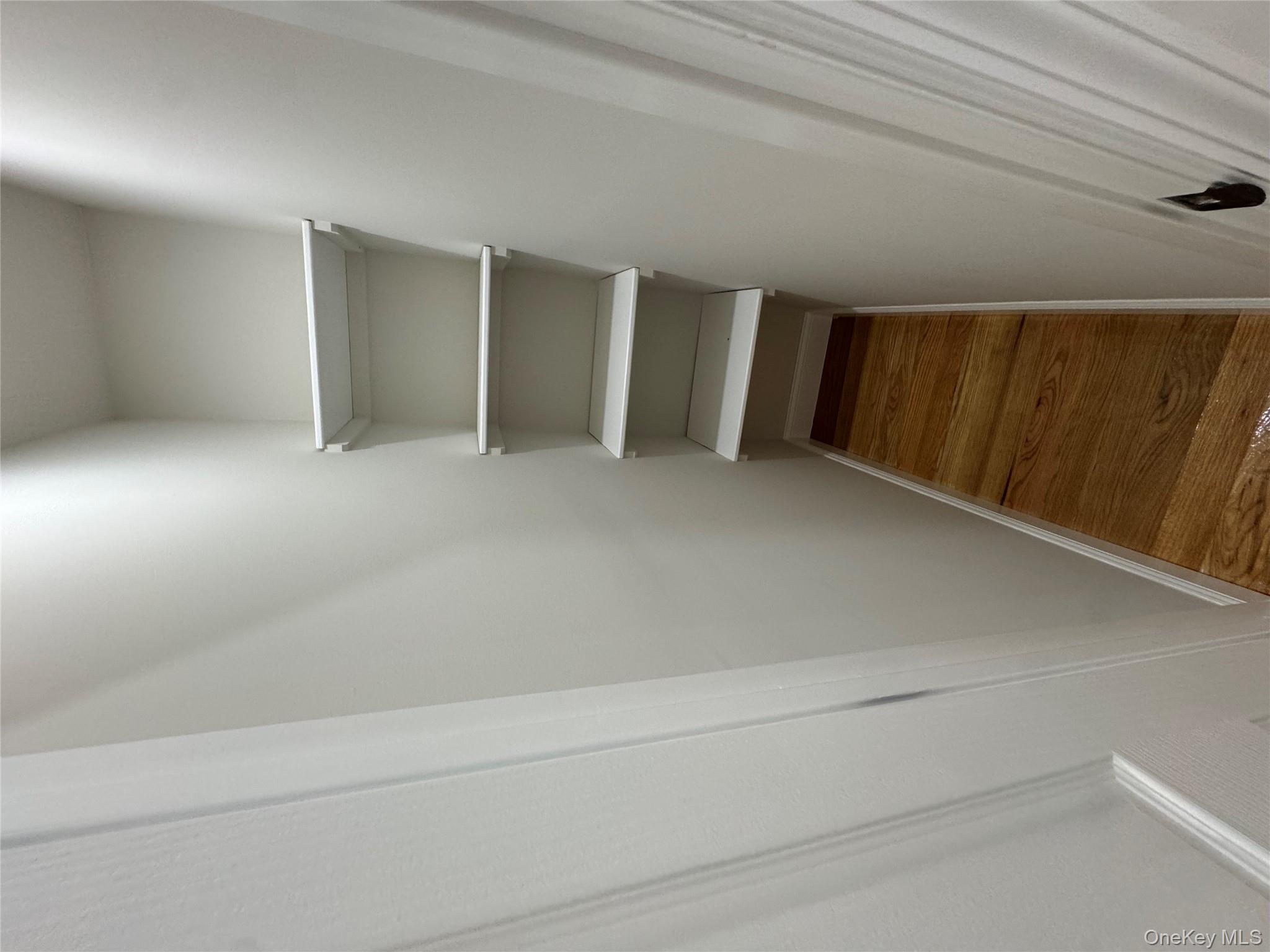 194-45 Murdock Avenue Queens, NY 11412 - Photo 15 of 23 a hallway view with staircase