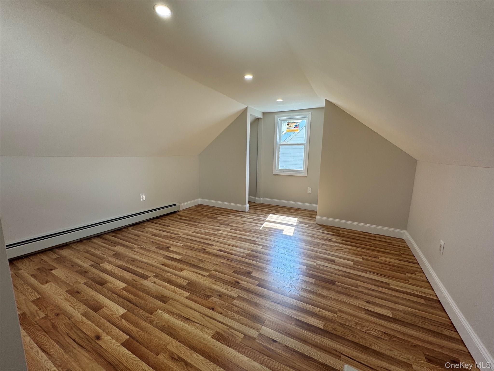 194-45 Murdock Avenue Queens, NY 11412 - Photo 18 of 23 wooden floor in an empty room