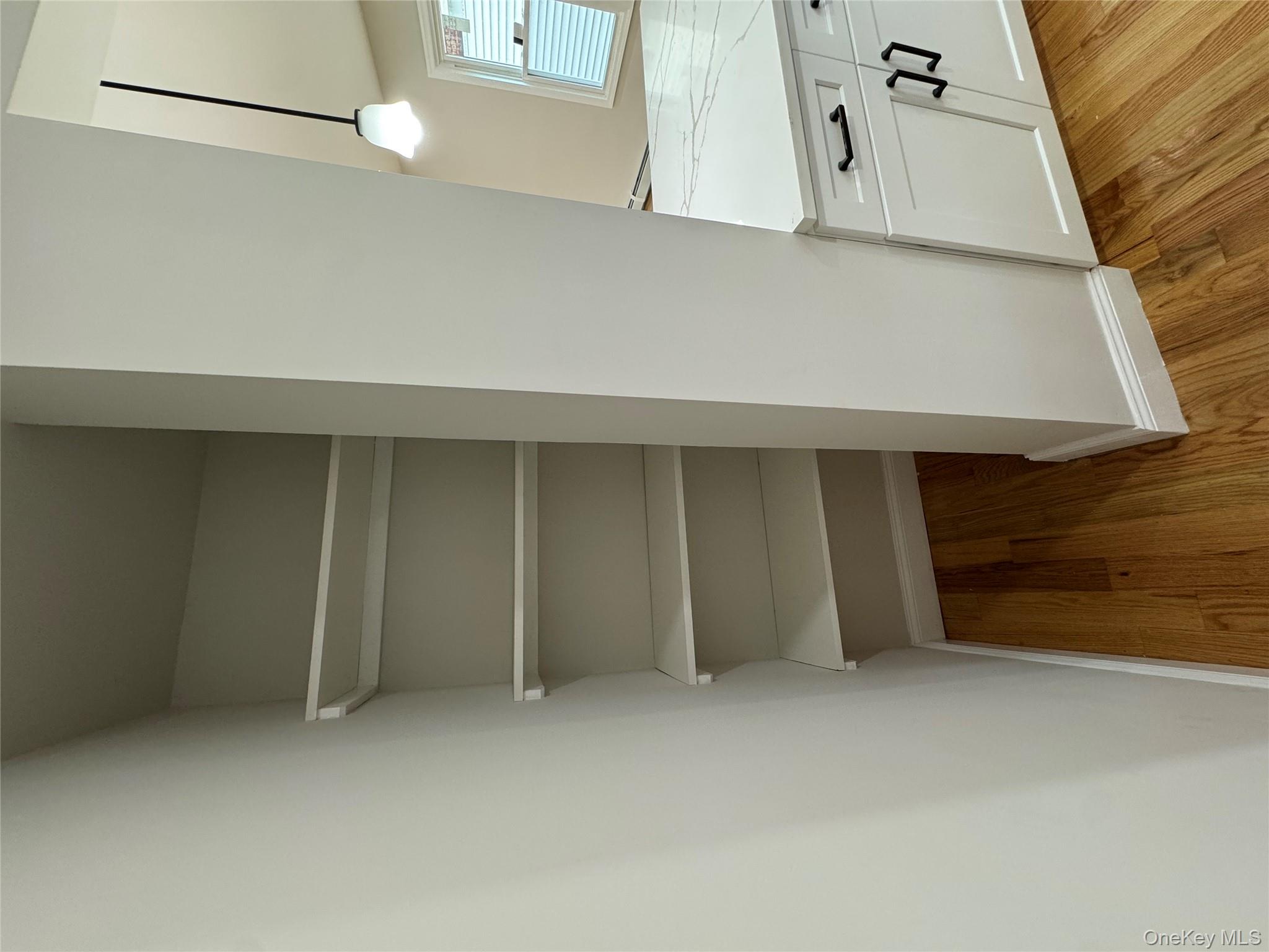 194-45 Murdock Avenue Queens, NY 11412 - Photo 8 of 23 a view of a room with storage