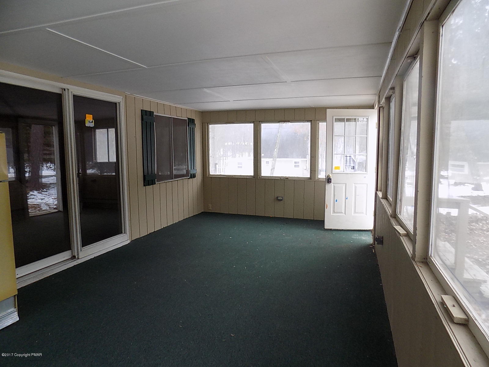 147 Yale Road Milford, PA 18337 - Photo 12 of 12 a view of empty room with floor to ceiling window