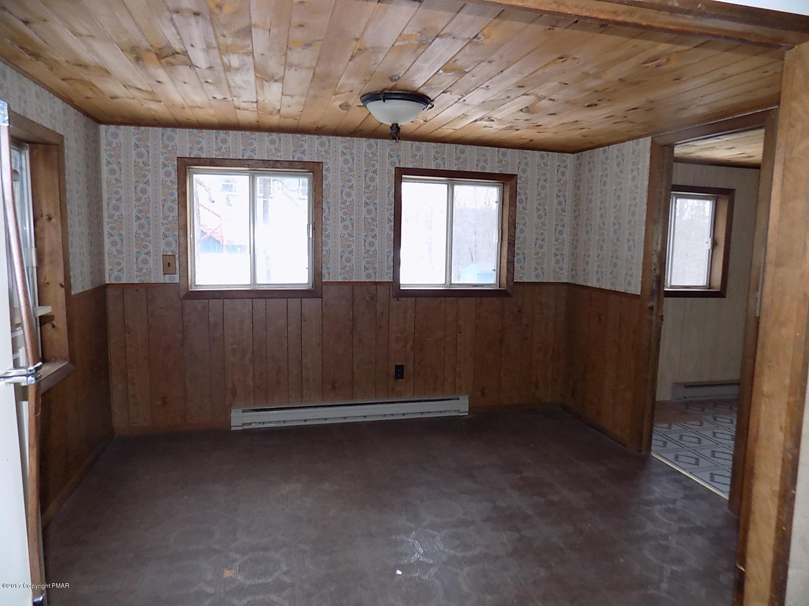 147 Yale Road Milford, PA 18337 - Photo 2 of 12 an empty room with windows