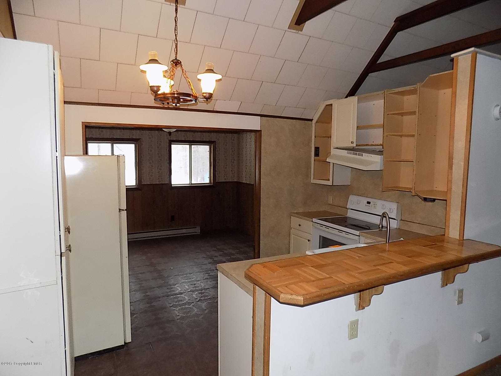 147 Yale Road Milford, PA 18337 - Photo 5 of 12 a kitchen with stainless steel appliances granite countertop a sink and cabinets