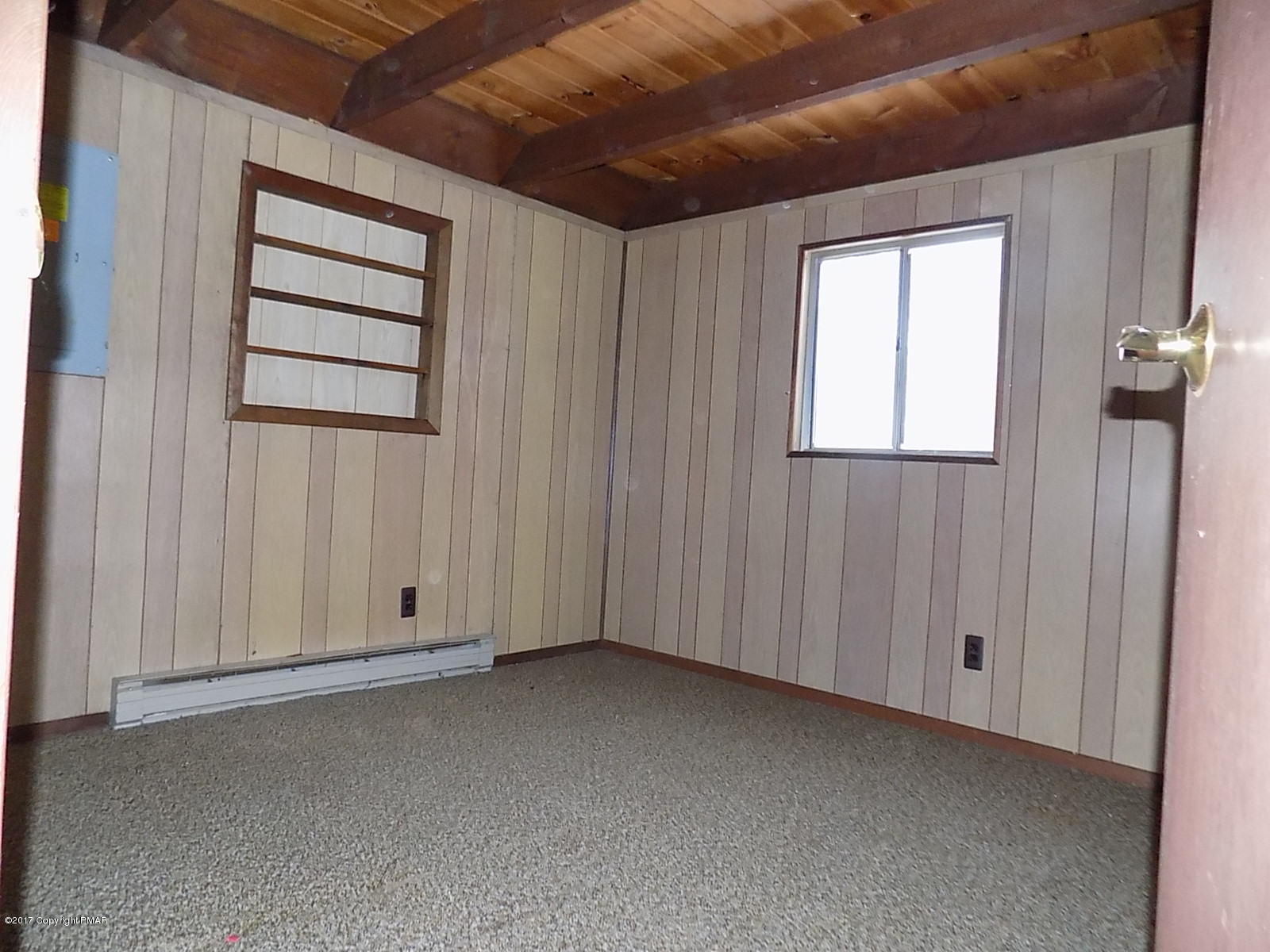 147 Yale Road Milford, PA 18337 - Photo 8 of 12 an empty room with windows