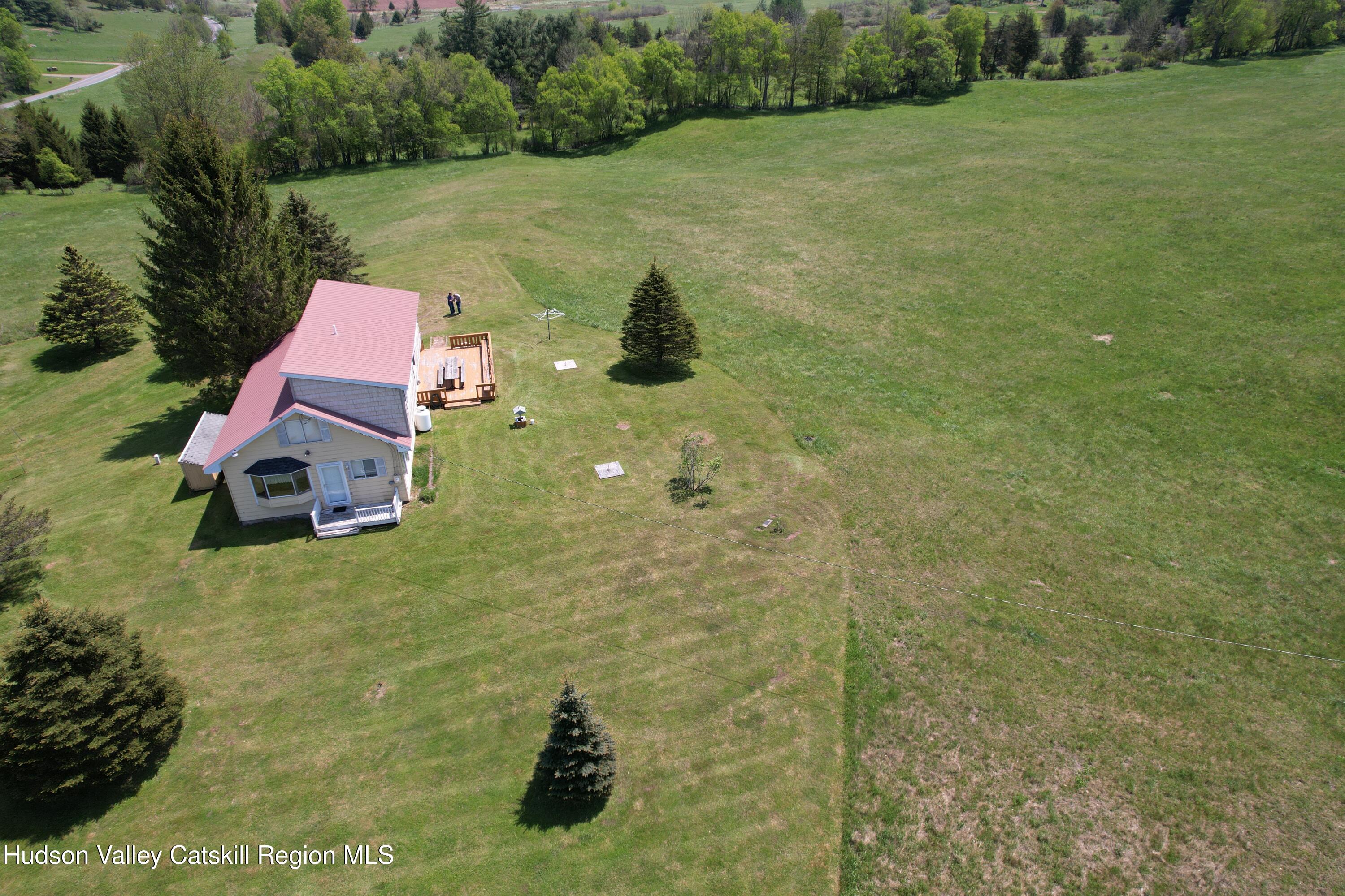 119 South Mountain Road Gilboa, NY 12076 - Photo 3 of 24 a view of a back yard of the house and front of a house