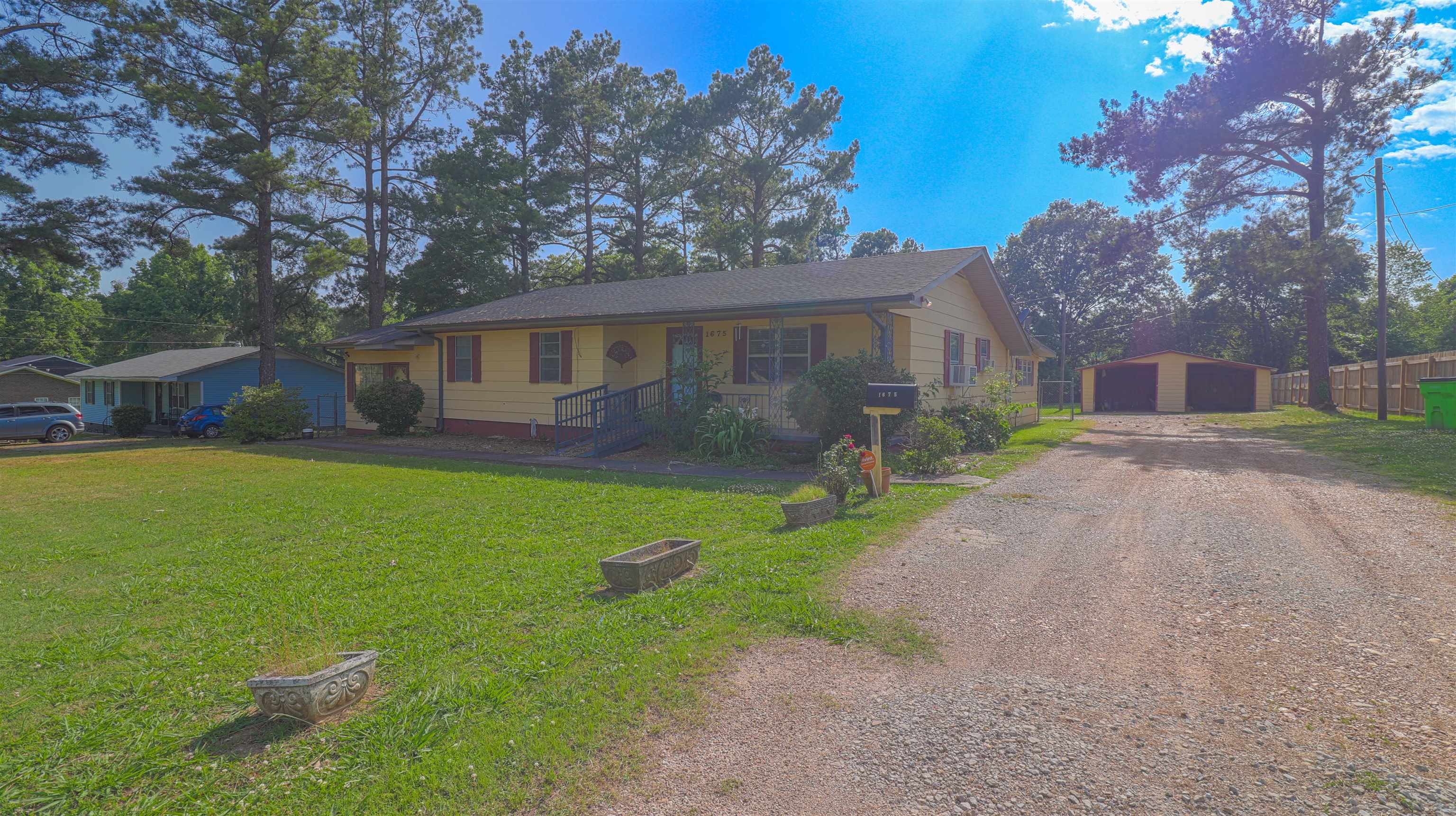 1675 Tabernacle Road Covington, TN 38019 - Photo 17 of 21 a front view of house with yard and green space
